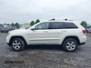 2011 Jeep Grand Cherokee Laredo with VIN 1J4RR4GG6BC680943, listed as a IAAI auction lot 42419575 with 188,672 mi miles and . Bid and sale history available at DreamBid. Image 14.