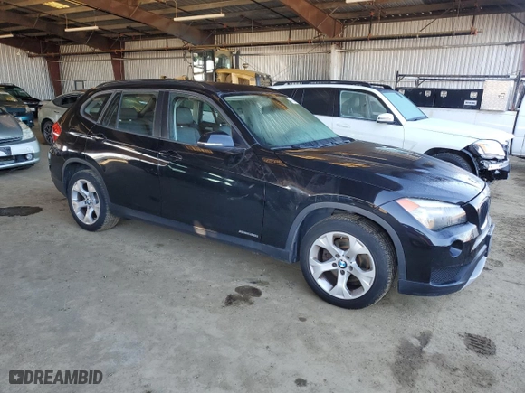 2013 BMW X1 28i with VIN WBAVM1C5XDVW44277, listed as a Copart auction lot 45601315 with 123,758 mi miles and Salvage Title. Bid and sale history available at carsss.com. Image 4.