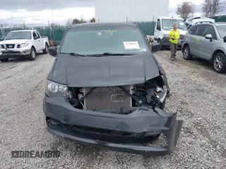 2018 Dodge Grand Caravan SXT with VIN 2C4RDGCG5JR156118, listed as a IAAI auction lot 41784516 with 113,474 mi miles and . Bid and sale history available at DreamBid. Image 13.