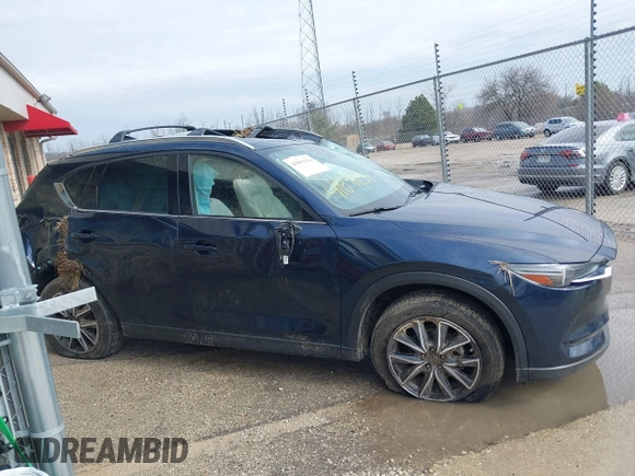 2018 Mazda CX-5 Grand Touring with VIN JM3KFADM1J1439544, listed as a IAAI auction lot 41891134 with 54,132 mi miles and . Bid and sale history available at DreamBid. Image 13.