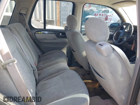 2005 GMC Envoy SLT with VIN 1GKDS13SX52175970, listed as a IAAI auction lot 42047871 with 205,432 mi miles. Bid and sale history available at carsss.com. Image 8.