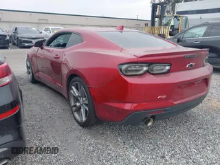 2021 Chevrolet Camaro 1LT with VIN 1G1FB1RX9M0107010, listed as a IAAI auction lot 42629591 with 65,450 mi miles and . Bid and sale history available at DreamBid. Image 3.
