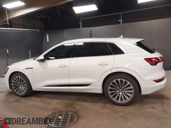 2019 Audi e-tron Prestige with VIN WA1VABGE3KB012371, listed as a IAAI auction lot 42314860 with 41,269 mi miles and . Bid and sale history available at DreamBid. Image 14.