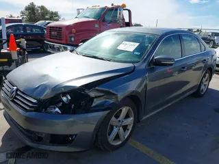 2013 Volkswagen Passat SE with VIN 1VWBP7A32DC144639, listed as a IAAI auction lot 41337338 with 147,878 mi miles. Bid and sale history available at carsss.com. Image 2.