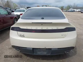 2014 Lincoln MKZ z VIN 3LN6L2JK7ER821385, wystawiony jako IAAI lot #42114154 z przebiegiem 141 480 mil mil oraz . Historia ofert i sprzedaży dostępna na DreamBid. Obrazek 17.
