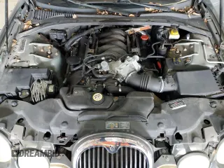 2003 Jaguar S-Type z VIN SAJEA01U93HM88490, wystawiony jako Copart lot #55721795 z przebiegiem 192 773 mil mil oraz Tytuł czysty. Historia ofert i sprzedaży dostępna na DreamBid. Obrazek 11.