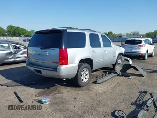 2012 GMC Yukon SLT z VIN 1GKS1CE01CR121916, wystawiony jako IAAI lot #41989372 z przebiegiem 223 608 mil mil oraz . Historia ofert i sprzedaży dostępna na DreamBid. Obrazek 4.