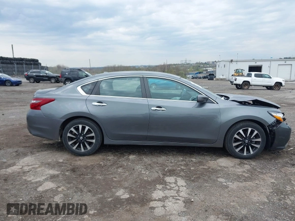 2018 Nissan Altima SR with VIN 1N4AL3AP0JC191207, listed as a IAAI auction lot 42033493 with 104,822 mi miles and . Bid and sale history available at carsss.com. Image 12.
