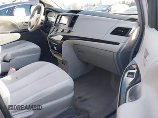 2012 Toyota Sienna with VIN 5TDKA3DC6CS015762, listed as a IAAI auction lot 41529216 with 219,136 mi miles and . Bid and sale history available at DreamBid. Image 5.