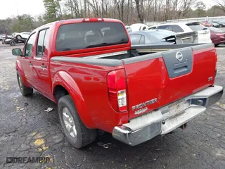 2009 Nissan Frontier SE with VIN 1N6AD07U99C411911, listed as a IAAI auction lot 41553405 with 108,734 mi miles. Bid and sale history available at carsss.com. Image 3.