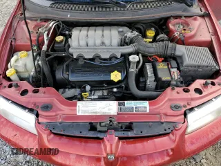 2000 Dodge Stratus z VIN 1B3EJ56HXYN234000, wystawiony jako Copart lot #75548584 z przebiegiem 177 191 mil mil oraz Szkody całkowita. Historia ofert i sprzedaży dostępna na DreamBid. Obrazek 13.