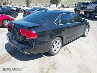 2012 Volkswagen Passat SE with VIN 1VWBP7A30CC025468, listed as a IAAI auction lot 41817638 with 204,508 mi miles. Bid and sale history available at carsss.com. Image 4.