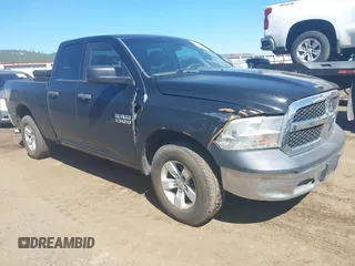 2013 Ram 1500 ST z VIN 1C6RR7FP7DS549528, wystawiony jako IAAI lot #40240302 z przebiegiem 165 494 mil mil oraz . Historia ofert i sprzedaży dostępna na DreamBid. Obrazek 1.