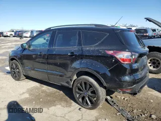 2017 Ford Escape Titanium with VIN 1FMCU9JD0HUC74354, listed as a Copart auction lot 42356345 with 184,816 mi miles and Salvage Title. Bid and sale history available at carsss.com. Image 2.