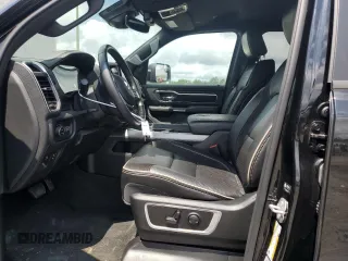 2023 Ram 1500 Laramie with VIN 1C6SRFRT1PN577199, listed as a Copart auction lot 64833895 with 22,119 mi miles and Salvage title. Bid and sale history available at DreamBid. Image 7.