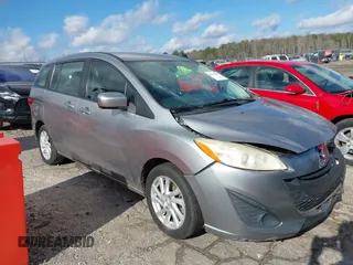 2012 Mazda 5 Sport with VIN JM1CW2BLXC0101310, listed as a IAAI auction lot 41207247 with 146,691 mi miles. Bid and sale history available at carsss.com. Image 1.
