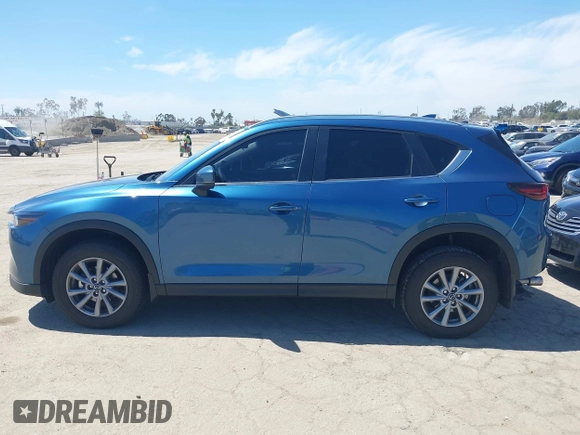 2023 Mazda CX-5 S Select with VIN JM3KFBBM3P0208376, listed as a IAAI auction lot 42023207 with 20,114 mi miles and . Bid and sale history available at carsss.com. Image 15.