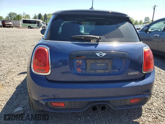 2014 MINI Hardtop S with VIN WMWXM7C51ET926090, listed as a Copart auction lot 55958745 with 148,997 mi miles and Salvage title. Bid and sale history available at DreamBid. Image 6.
