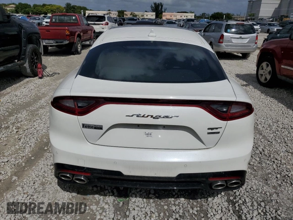 2021 Kia Stinger GT1 with VIN KNAE45LC9M6090262, listed as a Copart auction lot 77339854 with 3,354 mi miles and Salvage Title. Bid and sale history available at carsss.com. Image 6.