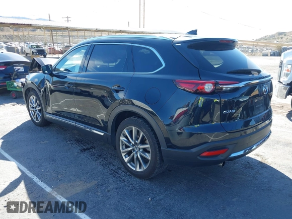 2018 Mazda CX-9 Grand Touring z VIN JM3TCADY8J0221221, wystawiony jako IAAI lot #41644721 z przebiegiem 41 510 mil mil oraz . Historia ofert i sprzedaży dostępna na DreamBid. Obrazek 3.