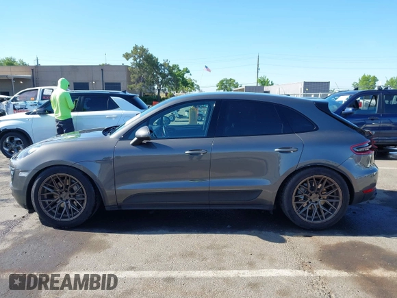 2015 Porsche Macan S with VIN WP1AB2A57FLB55185, listed as a IAAI auction lot 42259316 with 116,018 mi miles and . Bid and sale history available at DreamBid. Image 14.