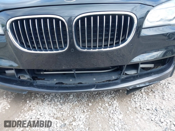 2013 BMW 7 Series 750Li z VIN WBAYE8C59DD133605, wystawiony jako IAAI lot #42179893 z przebiegiem 73 065 mil mil oraz . Historia ofert i sprzedaży dostępna na DreamBid. Obrazek 6.