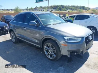 2015 Audi Q3 Prestige z VIN WA1GFCFSXFR014431, wystawiony jako IAAI lot #42708452 z przebiegiem 157 451 mil mil oraz . Historia ofert i sprzedaży dostępna na DreamBid. Obrazek 1.