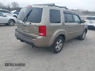 2011 Honda Pilot EX-L with VIN 5FNYF4H68BB038615, listed as a IAAI auction lot 41785830 with 164,324 mi miles and . Bid and sale history available at carsss.com. Image 4.