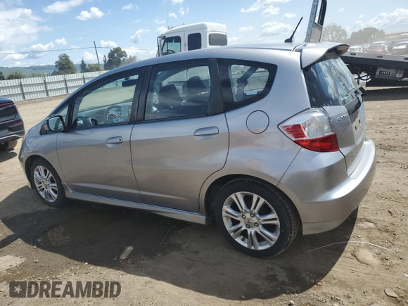 2009 Honda Fit Sport with VIN JHMGE88419S060438, listed as a Copart auction lot 51794995 with 116,961 mi miles and Salvage Title. Bid and sale history available at carsss.com. Image 2.