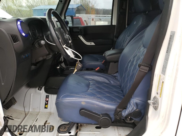 2017 Jeep Wrangler Unlimited Sport with VIN 1C4BJWDGXHL634930, listed as a Copart auction lot 52780985 with 74,873 mi miles and Salvage Title. Bid and sale history available at carsss.com. Image 7.