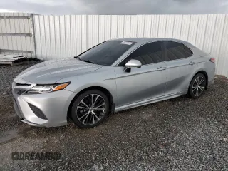 2018 Toyota Camry LE z VIN 4T1B11HKXJU079121, wystawiony jako Copart lot #58801005 z przebiegiem 168 944 mil mil oraz Czysty tytuł • Clean title. Historia ofert i sprzedaży dostępna na DreamBid. Obrazek 1.