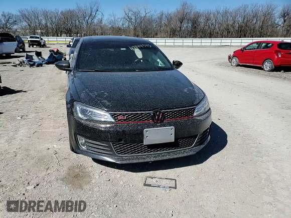 2014 Volkswagen Jetta GLI Edition 30 z VIN 3VW4S7AJ4EM325666, wystawiony jako Copart lot #47444345 z przebiegiem 182 665 mil mil oraz Szkoda całkowita • Salvage title. Historia ofert i sprzedaży dostępna na DreamBid. Obrazek 11.