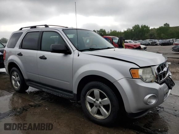 2011 Ford Escape XLT с VIN 1FMCU9DG8BKC62302, выставлен на аукционе Copart как лот 58240715 с пробегом 159 739 миль миль и Списание • Salvage title. История ставок и продаж доступна на DreamBid. Изображение 4.
