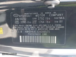 2013 Hyundai Elantra Coupe GS PZEV with VIN KMHDH6AE3DU006571, listed as a IAAI auction lot 42074843 with 161,612 mi miles. Bid and sale history available at carsss.com. Image 9.