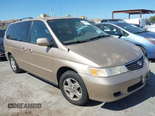 2001 Honda Odyssey EX z VIN 2HKRL18681H530346, wystawiony jako IAAI lot #42371126 z przebiegiem 211 604 mil mil oraz . Historia ofert i sprzedaży dostępna na DreamBid. Obrazek 1.
