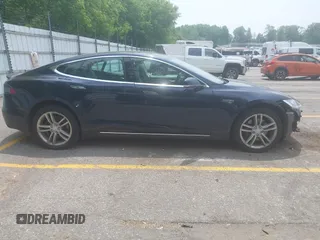 2013 Tesla Model S Performance z VIN 5YJSA1CP1DFP21827, wystawiony jako IAAI lot #42494897 z przebiegiem 148 150 mil mil oraz . Historia ofert i sprzedaży dostępna na DreamBid. Obrazek 14.