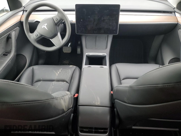 2025 Tesla Model Y Long Range with VIN 7SAYGDED1SF248427, listed as a Copart auction lot 43988825 with 1,891 mi miles and Salvage Title. Bid and sale history available at DreamBid. Image 8.