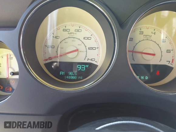 2012 Dodge Challenger SXT Plus with VIN 2C3CDYAG1CH262352, listed as a IAAI auction lot 41662002 with 141,868 mi miles. Bid and sale history available at carsss.com. Image 7.