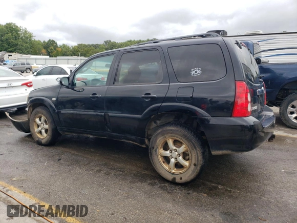 2005 Mazda Tribute S with VIN 4F2YZ04195KM65089, listed as a Copart auction lot 70993244 with Not Provided miles and Salvage Title. Bid and sale history available at DreamBid. Image 2.