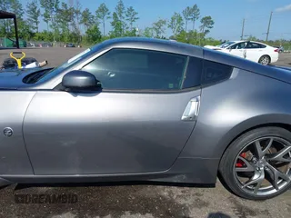 2013 Nissan 370Z with VIN JN1AZ4EH1DM880983, listed as a IAAI auction lot 41937876 with 130,613 mi miles. Bid and sale history available at carsss.com. Image 14.