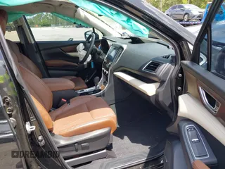 2022 Subaru Ascent Touring with VIN 4S4WMARDXN3463890, listed as a IAAI auction lot 42359804 with 26,713 mi miles and . Bid and sale history available at DreamBid. Image 5.