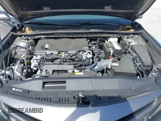 2024 Toyota Camry SE z VIN 4T1G11AK8RU901040, wystawiony jako IAAI lot #41977610 z przebiegiem 12 694 mil mil oraz . Historia ofert i sprzedaży dostępna na DreamBid. Obrazek 10.
