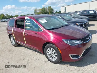 2018 Chrysler Pacifica Touring L with VIN 2C4RC1BG0JR279665, listed as a IAAI auction lot 40336389 with 80,835 mi miles and . Bid and sale history available at DreamBid. Image 1.