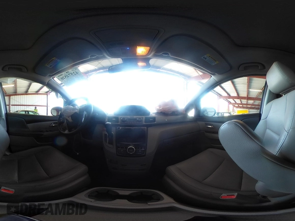 2017 Honda Odyssey Touring with VIN 5FNRL5H90HB017215, listed as a IAAI auction lot 42574528 with 61,386 mi miles and . Bid and sale history available at DreamBid. Image 18.