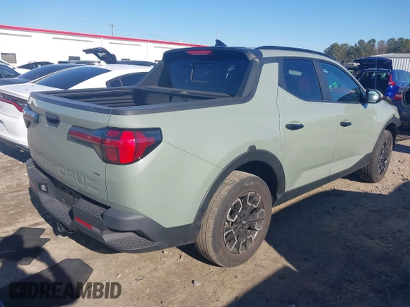 2022 Hyundai Santa Cruz SEL with VIN 5NTJCDAE2NH036992, listed as a IAAI auction lot 41335058 with 43,152 mi miles and . Bid and sale history available at DreamBid. Image 4.
