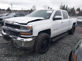 2017 Chevrolet Silverado 1500 LT with VIN 1GCUKREC1HF135337, listed as a IAAI auction lot 41267713 with 114,417 mi miles and . Bid and sale history available at DreamBid. Image 2.