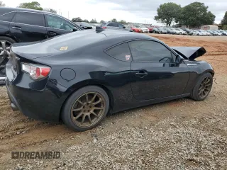 2016 Subaru BRZ Premium with VIN JF1ZCAB10G9605013, listed as a Copart auction lot 71466524 with 141,747 mi miles and Salvage Title. Bid and sale history available at DreamBid. Image 3.