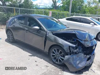 2022 Mazda 3 Select with VIN JM1BPAKL1N1519383, listed as a IAAI auction lot 39742243 with 20,080 mi miles and . Bid and sale history available at DreamBid. Image 1.