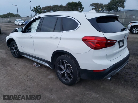2018 BMW X1 sDrive28i with VIN WBXHU7C35J5H43995, listed as a Copart auction lot 71650602 with 80,437 mi miles. Bid and sale history available at carsss.com. Image 2.