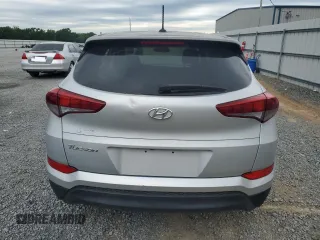 2016 Hyundai Tucson SE z VIN KM8J23A46GU242131, wystawiony jako Copart lot #57599675 z przebiegiem 76 940 mil mil oraz Czysty tytuł • Clean title. Historia ofert i sprzedaży dostępna na DreamBid. Obrazek 6.